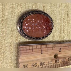 Sterling cameo brooch.